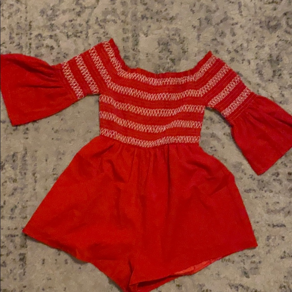 Red smocked romper
